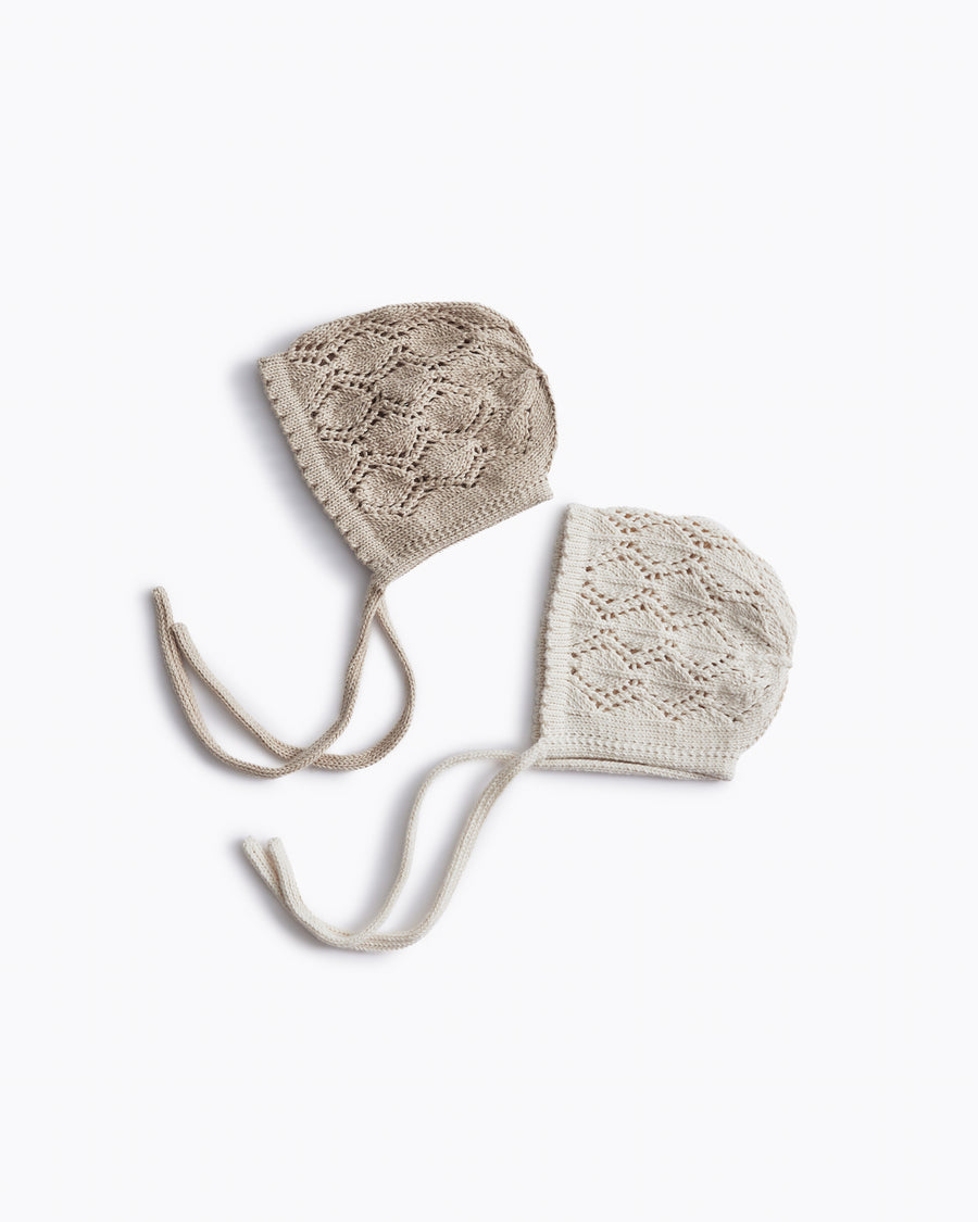 newborn knitwear hand knit baby bonnets in pima cotton