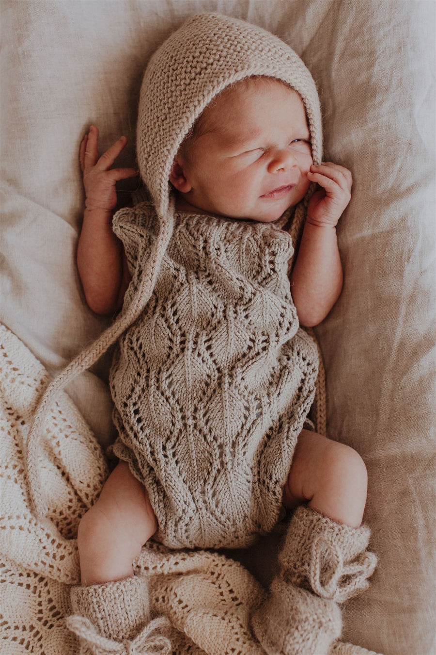 heirloom knitwear romper for newborn baby knits