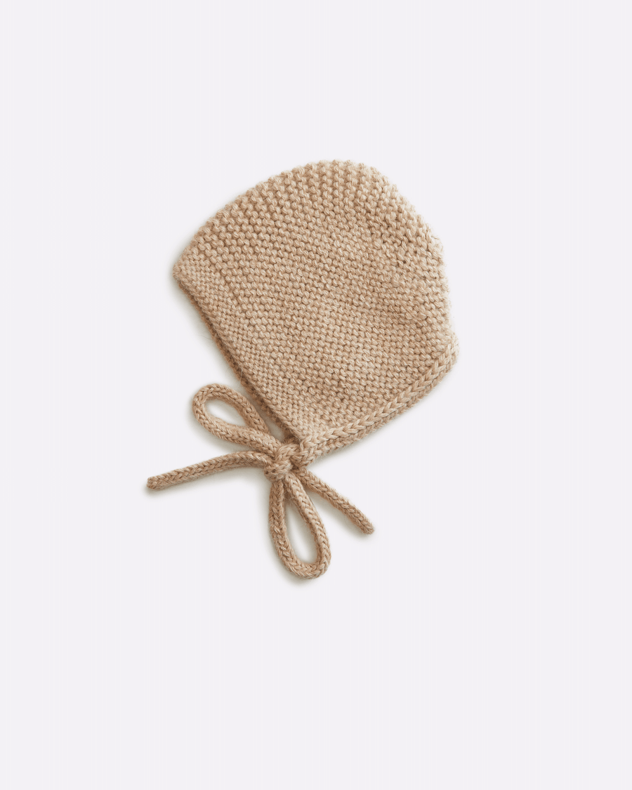 Dune coloured heirloom knit alpaca Barbara bonnet tied up by Hank knitwear